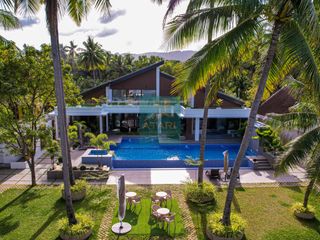 For Sale: Luxurious 4-Bedroom Beachfront Estate with Expansive Garden in Carmen