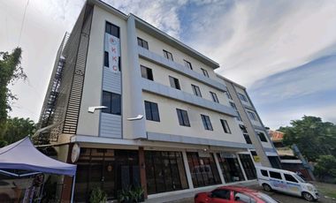 Two-Storey Prime Location Commercial Building with 30 Rentable Spaces