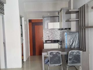 Apartement dengan 2 kamar tidur dan sky garden