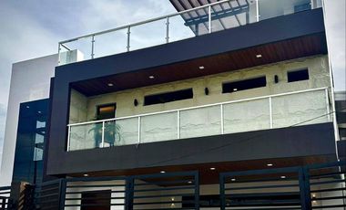Modern Tropical Contemporary House and Lot for sale inside a high - end Subd.