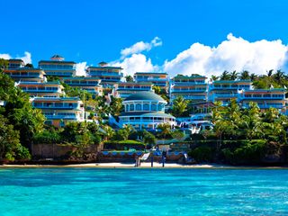 Finest Residential Service Property nestled in a tropical park with ocean view
