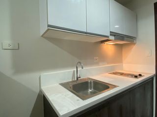 Semi-Furnished Unit with Balcony at Air Residences for Rent