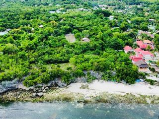 CLLIFSIDE BEACH LOT WHITESAND FOR SALE IN TAWALA PANGLAO ISLAND OF BOHOL