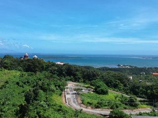 For Sale: Prime Overlooking Lot with Panoramic Ocean & Mountain Views