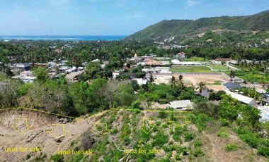 land near Mandalika incultural school direct access to the road