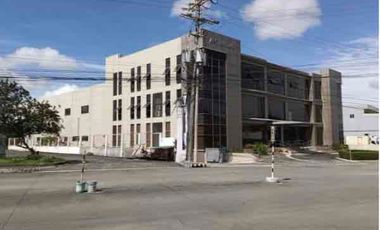 Four-Storey Office & Industrial Building with Penthouse, Basement, and Warehouses