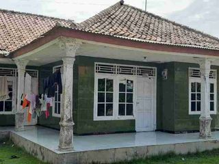 dijual rumah pinggir jalan