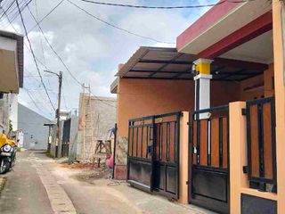 Di jual rumah baru minimalis permanen disain yg sangat bagus lokasi jln hj Basir pondok kacang barat Tangerang selatan