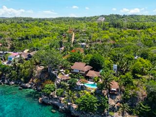 Experience the ultimate cliffside escape in this stunning coastal sanctuary