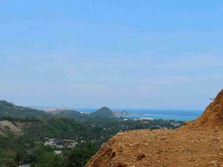 hill land with ocean view for sale