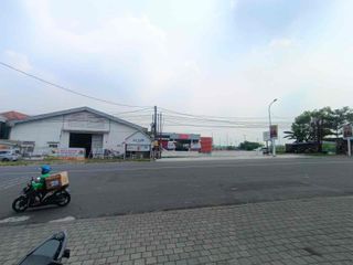DIJUAL TANAH + GUDANG  DEPAN CITRALAND DRIYOREJO 4jt/meter