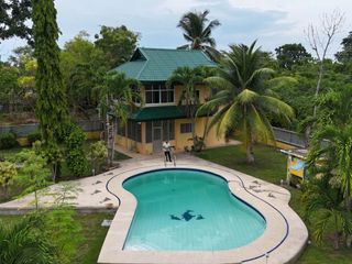 HOUSE AND LOT FOR SALE WITH SWIMMING POOL AND WALKING DISTANCE TO THE BEACH IN PANGLAO ISLAND BOHOL