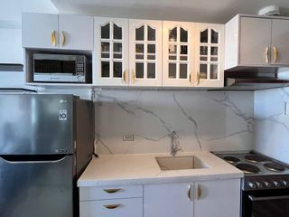 Premium fully-furnished 22.2 sqm studio on the 21st floor of Horizons 101 Tower 2, overlooking Cebu Pier and the city skyline.